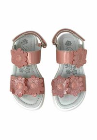 Sandali rosa con due décor a forma di fiore su ogni cinturino, materiale lucido, fodera leggermente testurizzata e suola bianca. Include cinturino alla caviglia regolabile.