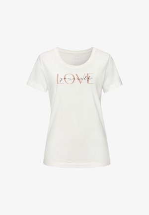 Valge puuvillane T-särk, millel on tekst "ARMSTA ennast" roosakuldse ja musta värviga, ümmargune kaelus ja lühikesed varrukad.