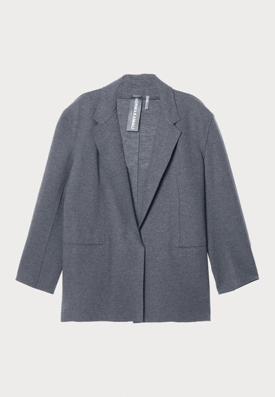Gray blazer made from textured fabric, featuring a notched lapel, open front, and two front pockets; relaxed fit with three-quarter sleeves.