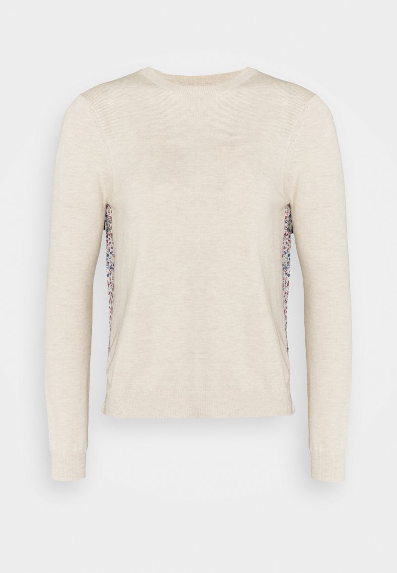Cremfarbener Pullover mit langen Ärmeln, der eine strukturierte Strickfront und einen floral gemusterten Stoff an den Seiten hat. Rundhalsausschnitt und eng anliegende Bündchen.