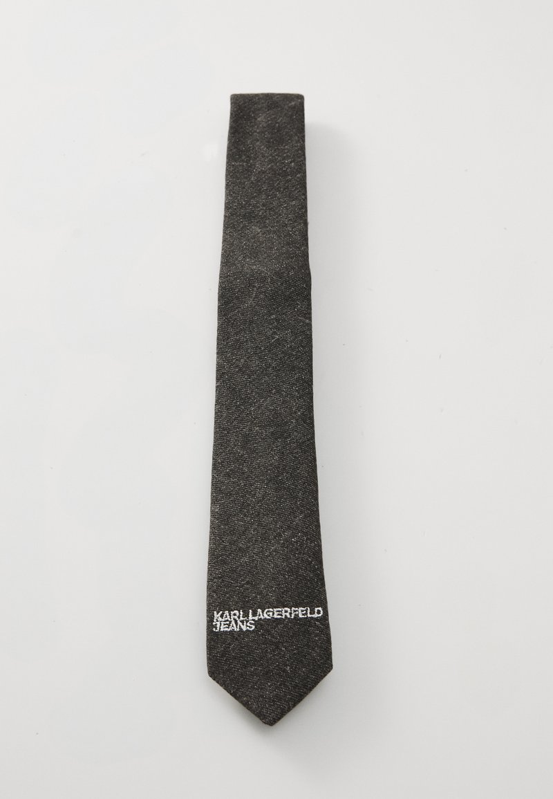 Slim, dark gray tie made of textured fabric, featuring a pointed end and white embroidered "KARL LAGERFELD JEANS" logo on one side.