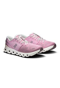 Light pink running shoes with a breathable mesh upper, white laces, and a white sole featuring cushioned pods. Logo displayed on the side.