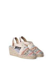 Sandalias espadrilles de tela tejida con un upper de estampado en tonos multicolores, correas de lona beige y tacón de cuña envuelto en yute.