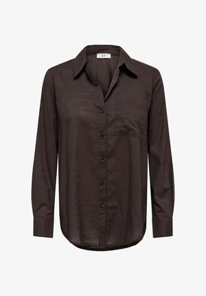 Chemise marron foncé à manches longues avec fermeture boutonnée sur le devant, poche poitrine unique et tissu lisse et léger. Ourlet incurvé pour un détail supplémentaire.