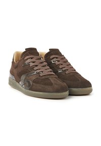 Pair of brown suede sneakers with perforated details, glossy side accents, and beige cushioned inner lining, shown against a white background.