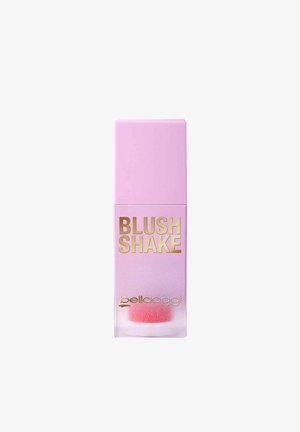 Blush liquido in un flacone trasparente con sfumature rosa e un tappo quadrato. Presenta scritte dorate "BLUSH SHAKE" e una punta applicatrice morbida.