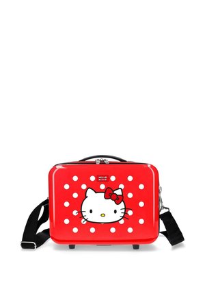 Bolsa rígida roja de Hello Kitty con lunares blancos, correa de hombro negra ajustable y asa superior para llevar.