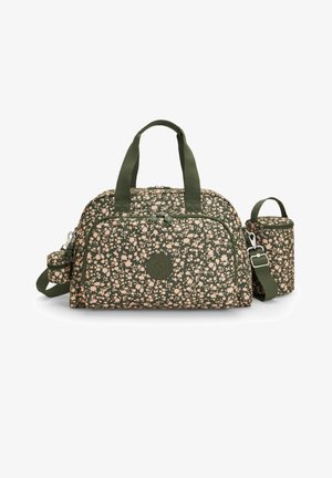 Sac de sport vert à motif floral avec poche zippée avant, deux poignées de transport et pochette latérale cylindrique assortie avec bandoulière.