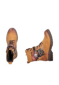 Rieker Lace-up ankle boots - gelb
