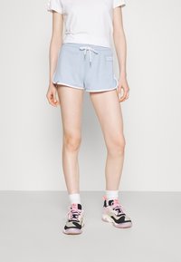 Ellesse Teplákové kalhoty - light blue