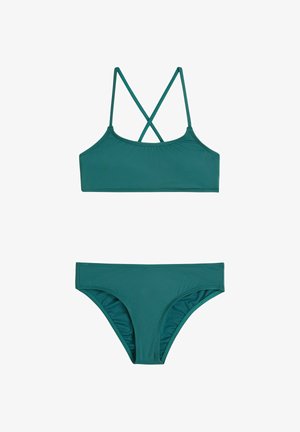 Bikini bleu sarcelle avec un haut à bretelles croisées et des bretelles réglables, accompagné d'un bas hipster assorti. Tissu lisse et extensible.