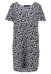 Kukkamekko kevyestä kankaasta, jossa on V-pääntie, lyhyet hihat sekä musta- ja purppurakukkakuvio valkoisella taustalla.