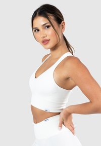 Smilodox AMAZE PRO RACERBACK BH - Sport-bh met medium support - creme
