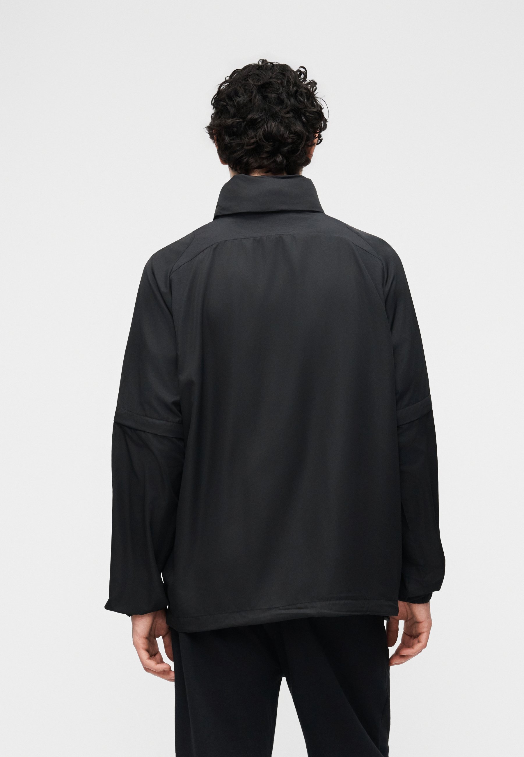 Umbro ZIP OFF SLEEVE WIND JACKET - Windbreaker - black - Zalando.ie