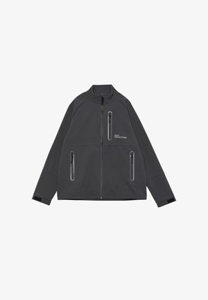 Grijze zip-up jas met hoge kraag, drie met rits afgesloten zakken en contrasterende textuurpanelen op de mouwen. Glad buitenmateriaal.