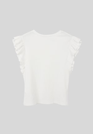 Valge varrukateta särk, millel on õlanurgal volditud detailid, ühtlase halli tausta ees.