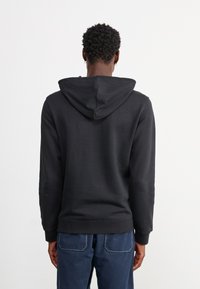 adidas Originals ESS HD - Felpa con cappuccio - black