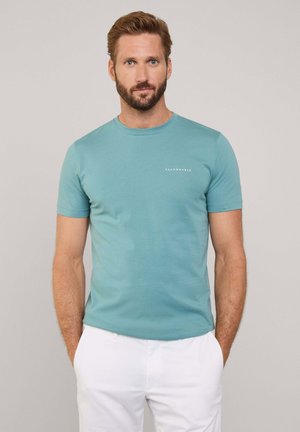 Lichtgroene katoenen T-shirt met een ronde hals en korte mouwen. Bevat een wit logo op de linkerborst. Soepele textuur, slim-fit ontwerp.