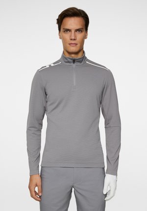 Grauer Langarmpullover mit einem halben Reißverschlusskragen, der weiße Akzentlinien an den Schultern und einen weichen, strukturierten Stoff aufweist.