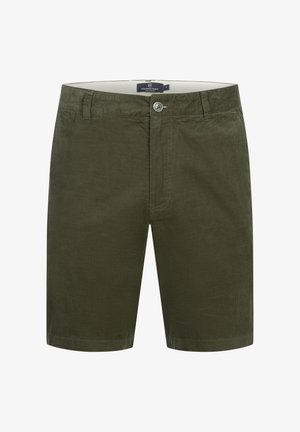 Olívové kraťasy vyrobené z kordu, s bočným zipsom, gombíkovým zapínaním a pútkami na opasok. Textúra je mäkká a jemne žebrovaná.