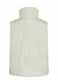 Vadderad ärmlös väst i ljus crème färg med hög krage och quiltad textur. Har detaljer med vertikala och horisontella stygn.