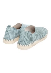 Light blue slip-on shoes with a textured reptile skin pattern and rounded cutout design. Cream-colored rubber sole with stitched detailing.
