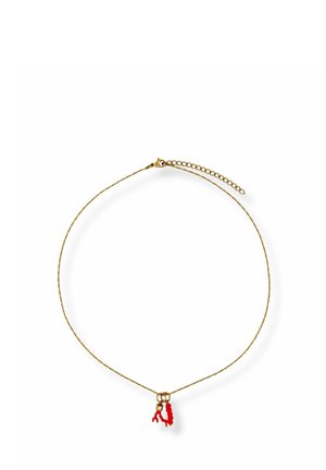 Delicate gold chain necklace with adjustable clasp featuring two small red coral-shaped pendants at the center.
