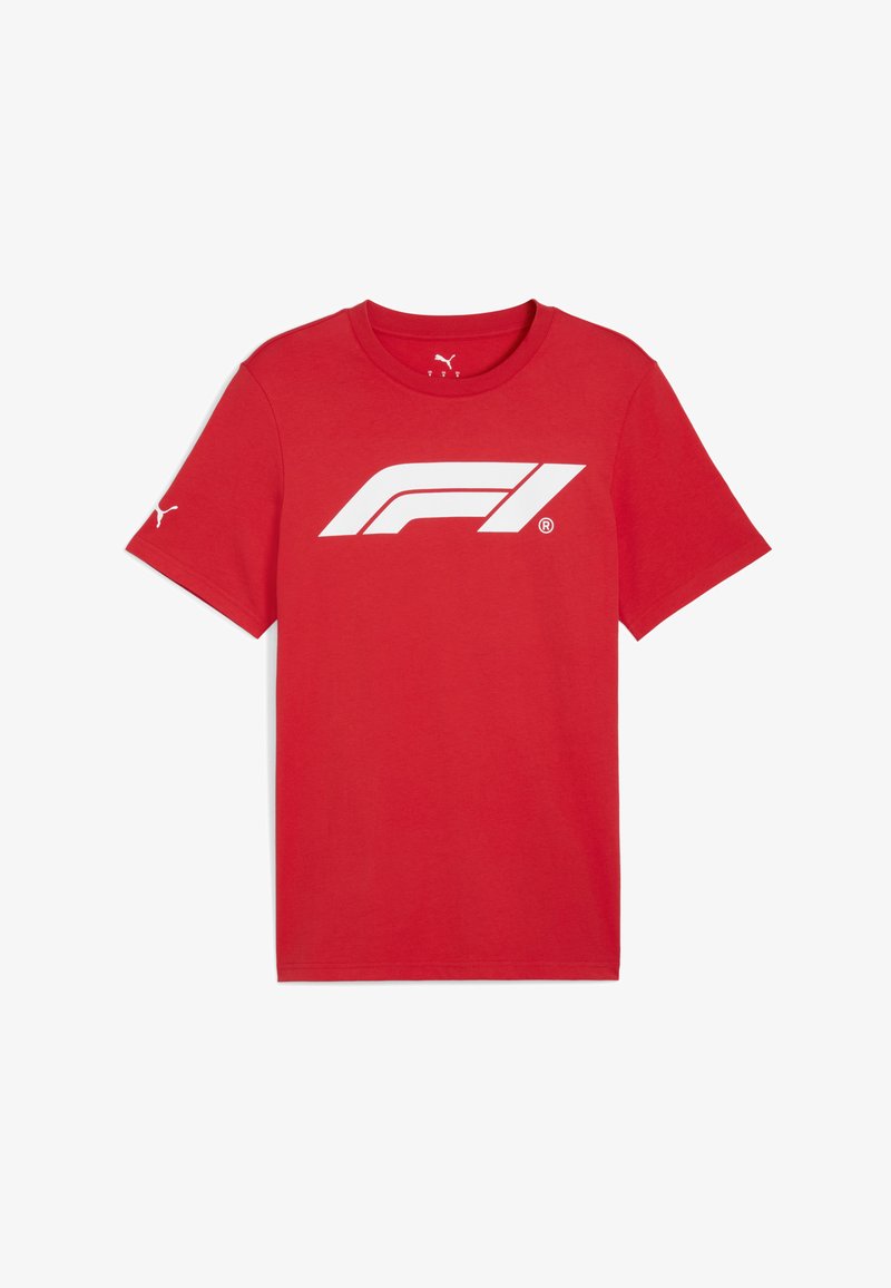 Raudonas medvilninis marškinėliai su dideliu baltu Formulės 1 logotipu priekyje, o kairiajame rankovėje mažas baltas Puma logotipas.