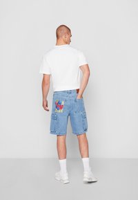 Karl Kani SMALL SIGNATURE - Szorty jeansowe