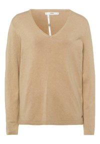 Beige Pullover mit langen Ärmeln und V-Ausschnitt aus weichem Material, mit minimalistischer Gestaltung und einem Markenetikett nahe dem Saum.