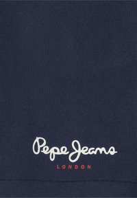 Námornícky modré bavlnené tričko s bielym nápisom "Pepe Jeans" a červeným textom "LONDON". Mäkká textura s klasickým dizajnom okrúhleho výstrihu.
