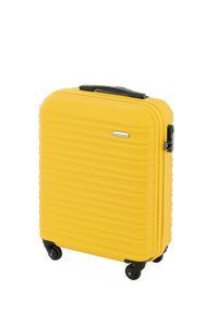 Žlutý tvrdý kufr s rýhovaným povrchem, černými kolečky a rukojetí. Disponuje zipovým uzávěrem a malým logem na přední straně.