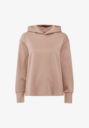 Długorękawowa bluza z kapturem w miękkim beżowym materiale, o luźnym kroju, z prążkowanymi mankietami oraz małym metalowym akcentem logo przy dolnej krawędzi.