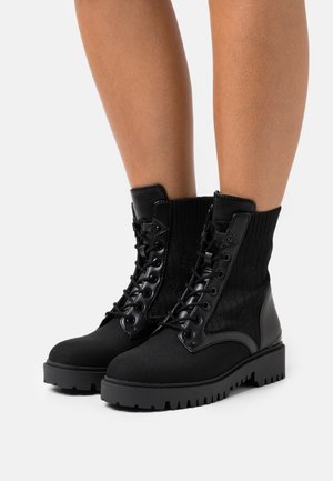 OLENNA - Lace-up ankle boots - black