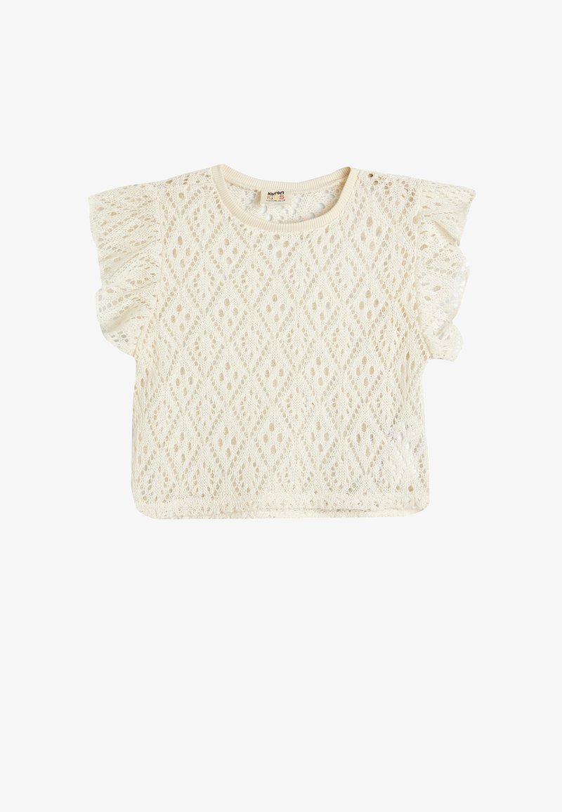 Hvid blonde top med korte ærmer og diamantmønster, med rynkede ærmer og rund halsudskæring. Letvægts- og tekstureret design.