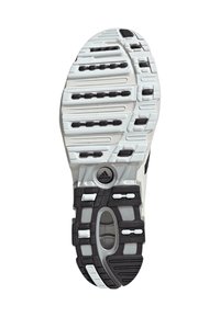 Balta un melna Adidas sporta apavu zole, kurai ir teksturēti gripu raksti un caurspīdīga ovāla daļa tuvumā papēdim.