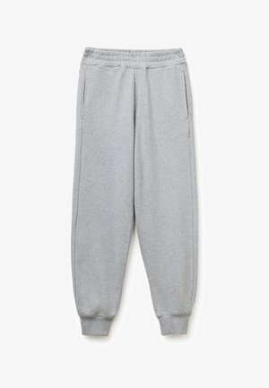 Šedé tepláky vyrobené z měkké, broskované látky. Elastický pas, dvě boční kapsy a těsně přiléhající lemy na kotnících. Jednoduchý design.