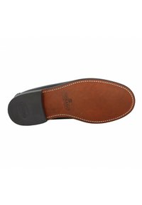 Brown leather shoe sole with a smooth finish, featuring a contrasting black heel and white stitching along the edges.