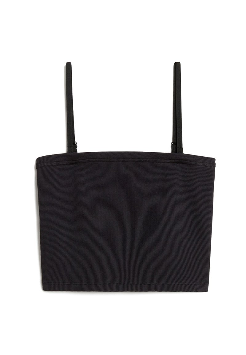 Svart ribbad crop top med tunna justerbara axelband och en strukturerad passform. Tyget har en slät yta och en enkel design.