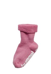 Rosa Kinderstrümpfe mit umschlägig gestaltetem Bund, aus weichem Stoff gefertigt. Mit weißem Branding an der Seite. Glatte Textur, Knöchellänge.