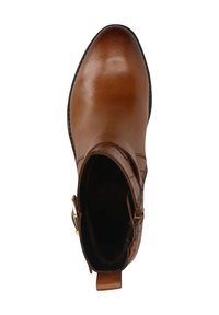 Brown leather ankle boot with a smooth finish, rounded toe, side zipper, and decorative strap accent. Inside is dark fabric lining.