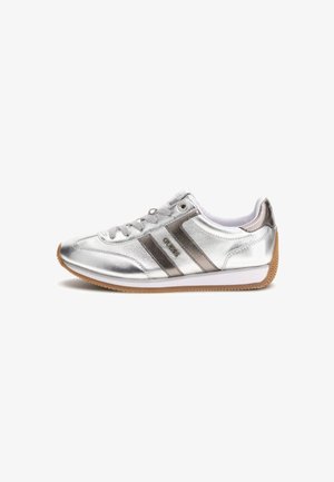 Silver metallic sneakers with white and brown accents. Features a sleek design, lace-up closure, and textured gum rubber sole.