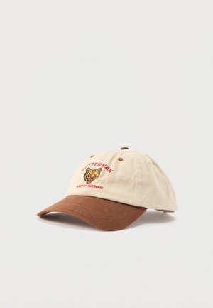 Casquette de baseball beige à visière marron avec une tête de tigre rugissante brodée et les textes rouges « CUTTERMAN » et « TOUJOURS DANGEREUX » à l'avant.