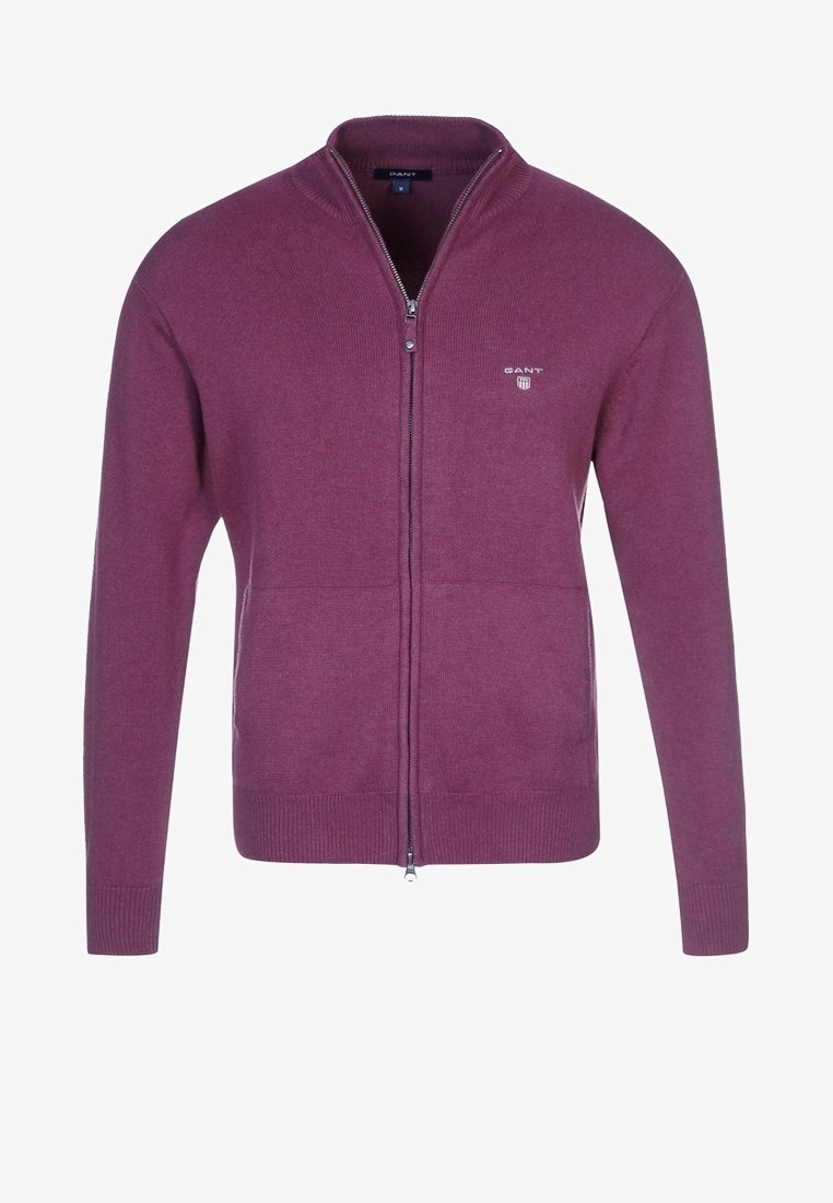 Cardigan na zip ve sytém švestkovém odstínu, vyrobený z pletené látky. Má stojáček a žebrované manžety a lem, zdobený logem.