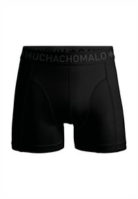 Čierne boxerské slipy so širokým pásom so značkou „MUCHACHOMALO“. Vyrobené z hladkej, elastickej látky s priliehavým strihom.