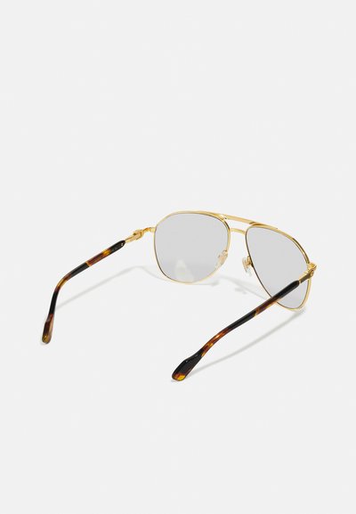 Gold metal aviator sunglasses with gray lenses, featuring a subtle double bridge and tortoiseshell-patterned acetate arms.
