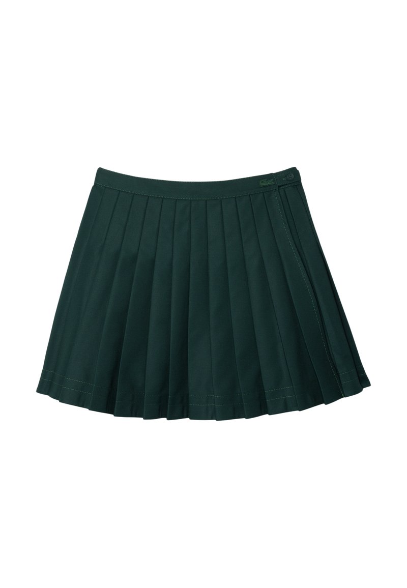 Grüne plissierte Röcke aus glattem Stoff. Verfügt über einen Bund und dezente Nahtdetails. Lässiges und vielseitiges Design.