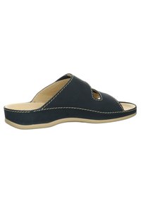 Sandale à glissière en cuir marine avec bout ouvert, deux découpes sur les côtés, coutures contrastantes beige et une semelle en caoutchouc beige.