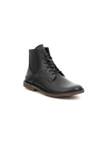 Botines de cuero negro con un acabado suave, puntera redonda, cierre de cordones en la parte delantera, paneles laterales elásticos y una suela de goma marrón contrastante.