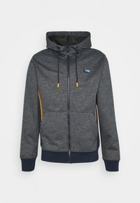 Mörkgrå zip-up hoodie med framfickor, dragsko i huvan med gula spetsar, och liten blå logotyp på vänster bröst.